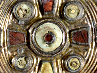 a Saxon garnet and gold brooch