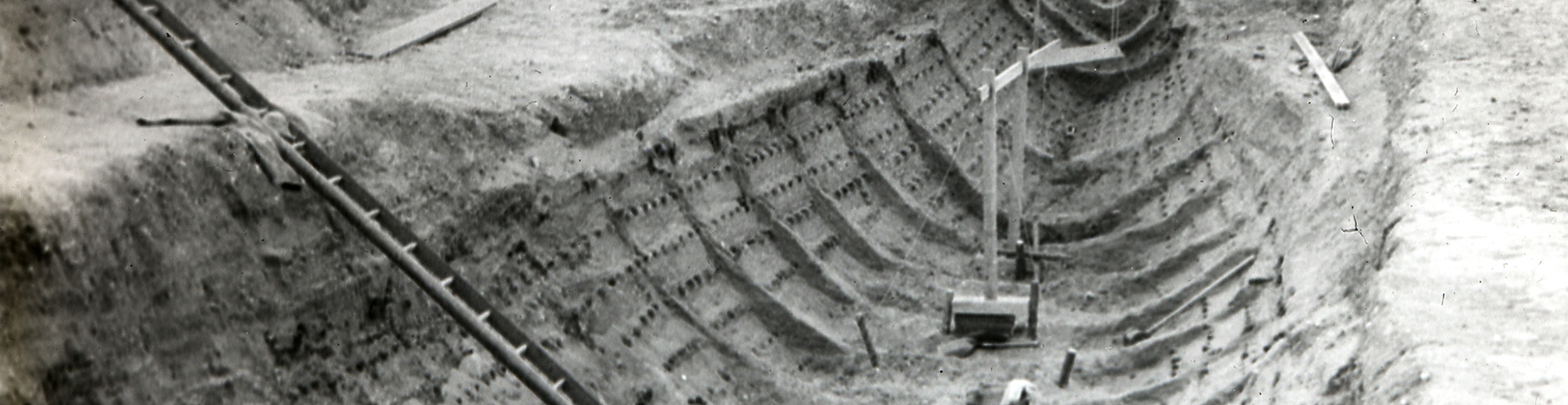 black and white photo of the Sutton Hoo ship burial excavation