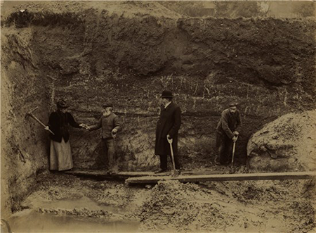 sepia photos of archaeologists excavating