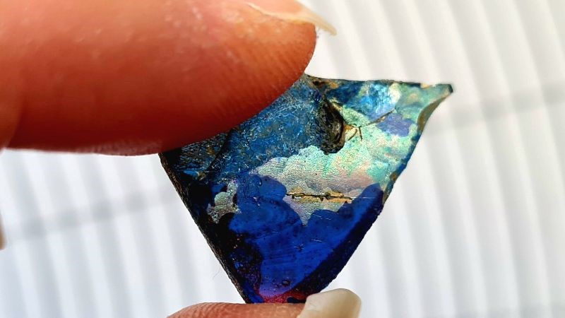 triangular fragment blue glass