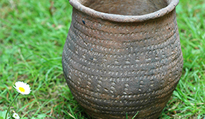 decorated complete pot grey on grass