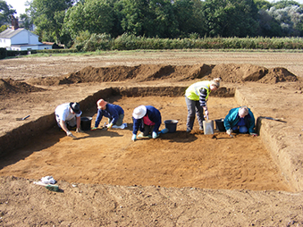 volunteers trowelling