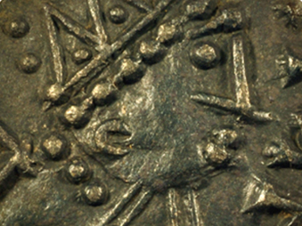 close up of silver anglo-saxon coin