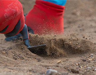 excavating with a trowel