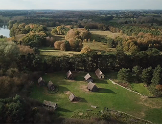 aerial view of west stow anglo-saxon village reconstructed buildings